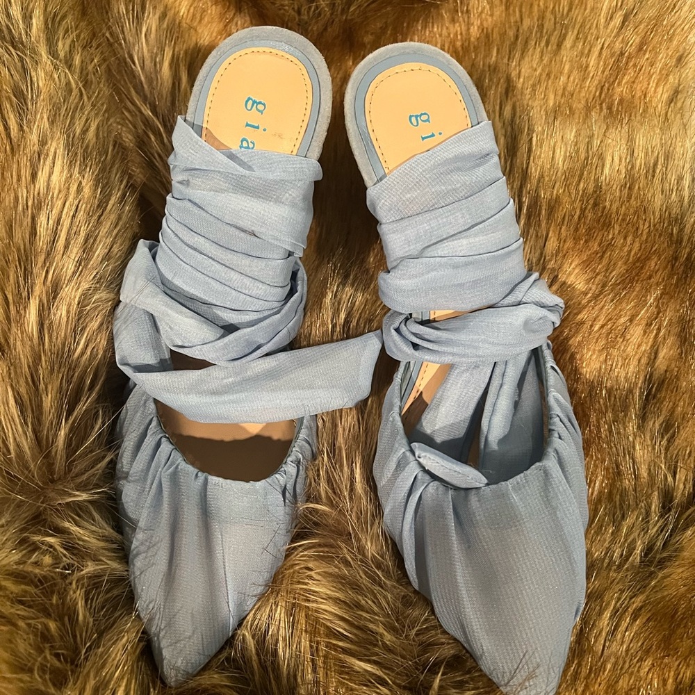 Brand new Gianni Bini wrap around the ankle shoe with a 3 1/2 inch heel.